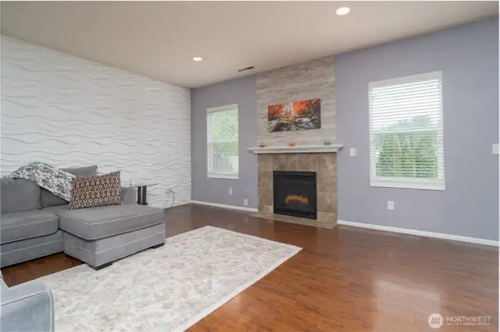 Living room with feature wall and gas fireplace