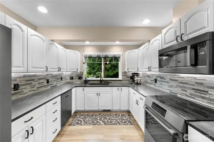 Kitchen with an abundance of cabinetry