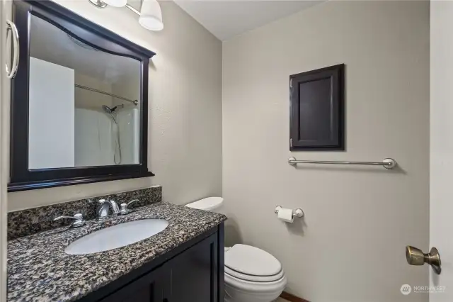 Full Guest bathroom off the hall near 2 bedrooms.