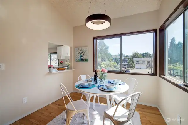 Dining room is cozy and bright