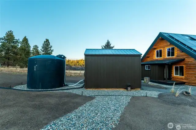 2500 gallon cistern next to wellhouse.
