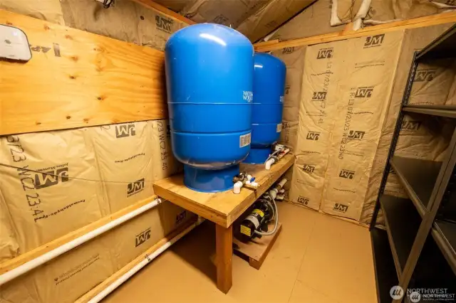 New wellhouse with generous storage space and shelving.