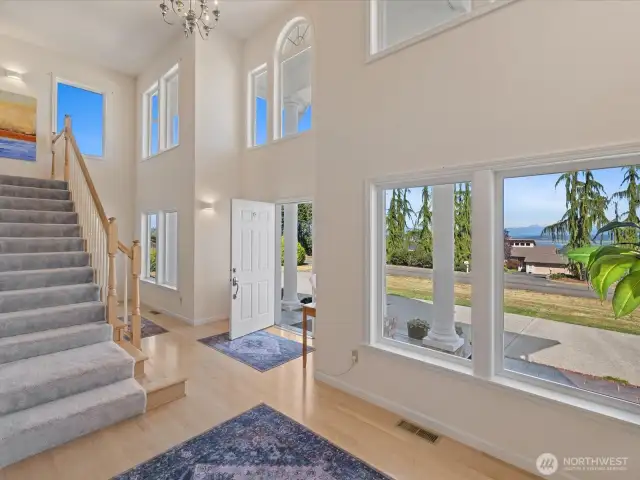Soaring ceiling Entry - with stairs up to Bedrooms & Bonus Room.