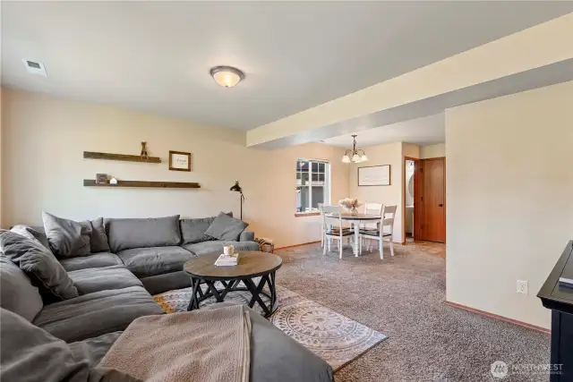 Open concept living to dining to kitchen on main level