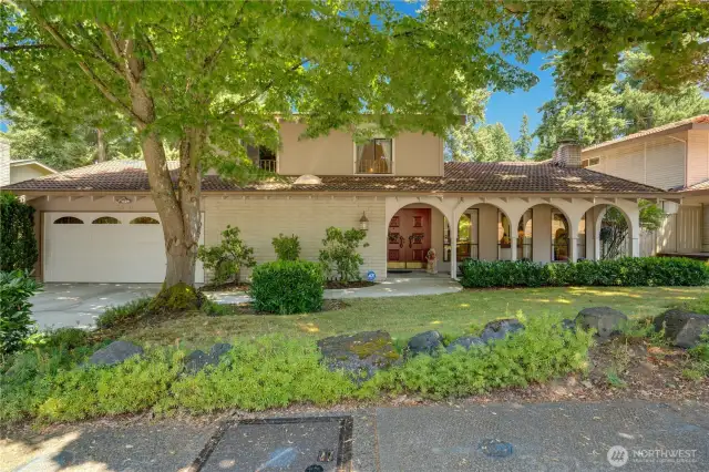 First time on the market in 57 years!  The front exterior boasts a durable tile roof and elegant arches framing picture windows, exuding timeless charm. Neatly landscaped, it offers striking curb appeal on the Twin Lakes Golf Course.