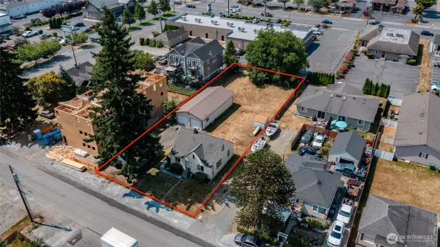 Home and shop on .3 level acres in town