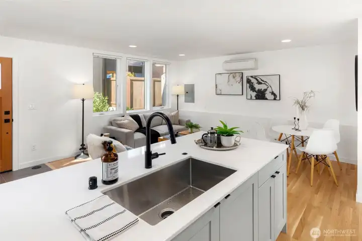 Open living area with access to yard.