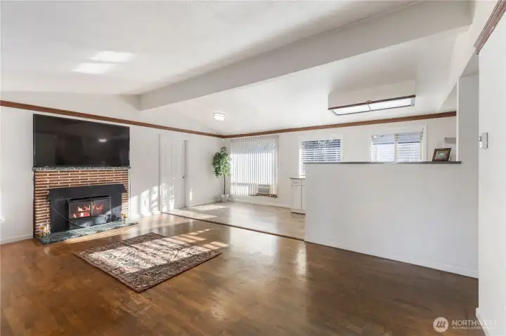 Original hardwood floors, and a really nice wood fireplace. Imagine a cold winter night, sitting on your couch enjoying the crackle of the fire, beverage in hand. It's a mood!