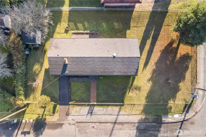 Drone shot of the yard. Very large, fully fenced, and just waiting for your creative touch. Oh, the possibilities!