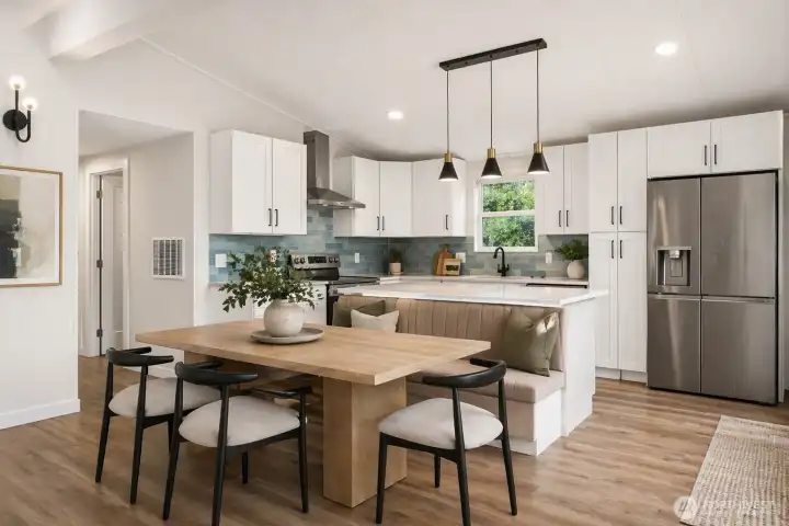 Kitchen Virtually Staged, White Shaker Cabinets, Blue Tile Backsplash, Island with Built-In Banquette, and Stainless Appliances