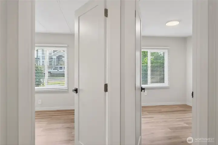 Hallway View with Both Bedroom Doors
