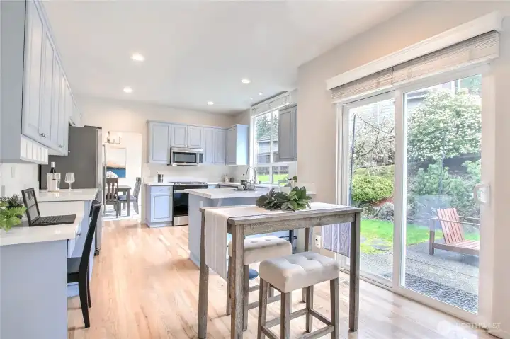 Large slider doors lead out to the huge patio and BBQ Area