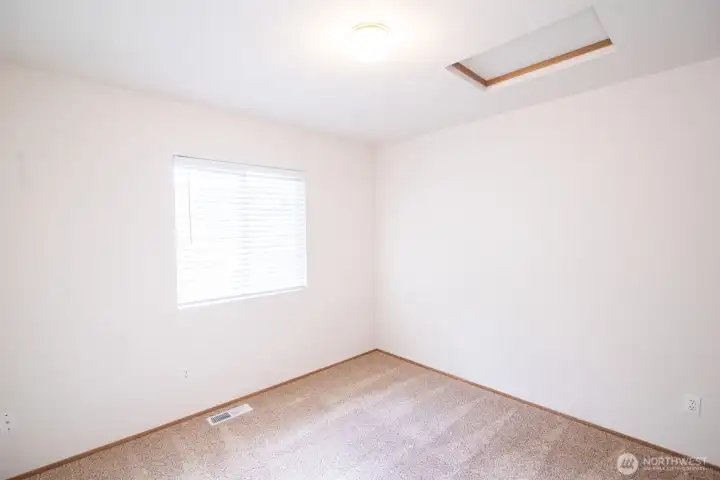 Second bedroom with beautiful morning sunlight. Second bedroom with beautiful morning sunlight.