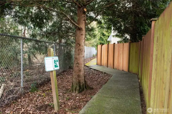 Private, gated, paved walking trail next to home.