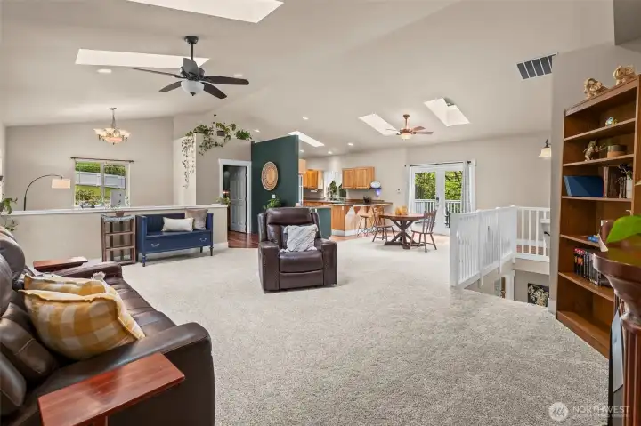 Lots of natural light in this open floor plan with vaulted ceilings and skylights!