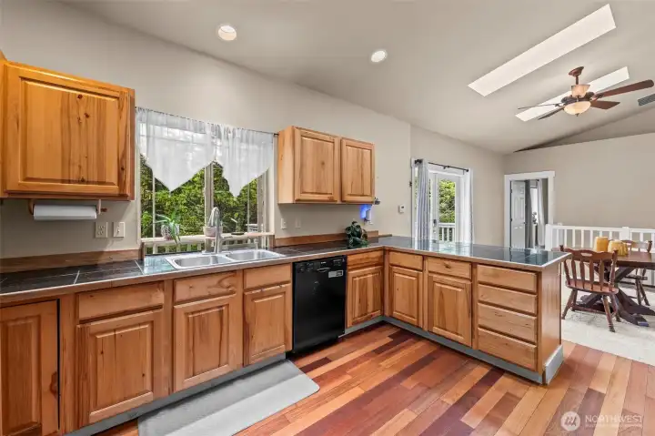 Roomy kitchen with plenty of cabinets and counter space.