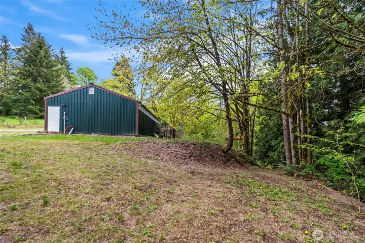 Side angle towards the detached shop