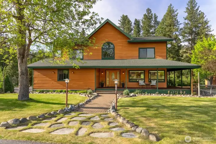 Winthrop's Wolf Creek neighborhood, has the ultimate riverfront recreation and retreat location for this 2,997 sf  is an absolute must-see! Double Garage attached. Over 300 feet of accessible Riverfront.  3 bedrooms, 3.5 Bath. Flexible floor plan. Winter Ski Trail is seconds away from this home. Private back-yard is full of wildlife and nature. Steps to the waterfront for a day of fishing, swimming, tubing and everything Summer offers here.