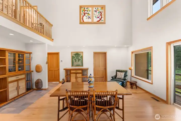 Beautiful dining room is a gracious space for all to absorb. Everything in this area is romantically eclectic along with luxury aesthetic. Maple hardwood floor. Plumbed for wet bar. This feature may be attractive for your entertaining.