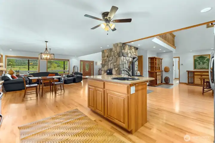 Kitchen has a commanding view of great room and dining room.