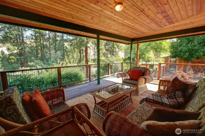 Back deck off of dining room is a lesson in restful intention. Be inspired.
