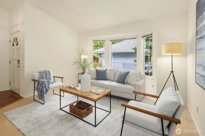 Living room with bay window overlooking private courtyard Living room with bay window overlooking private courtyard