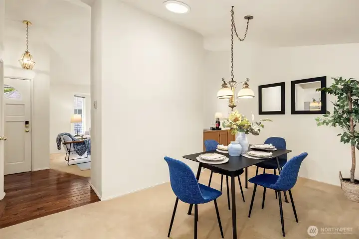 Hardwood floor entry leads to living room and dining room. Hardwood floor entry leads to living room and dining room.