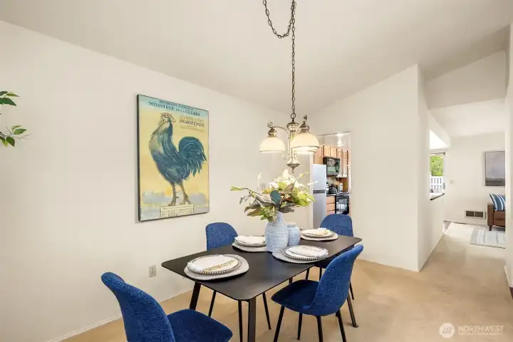 Dining room has convenient access to kitchen and family room. Dining room has convenient access to kitchen and family room.