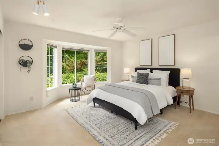 Primary suite overlooks natural area Primary suite overlooks natural area