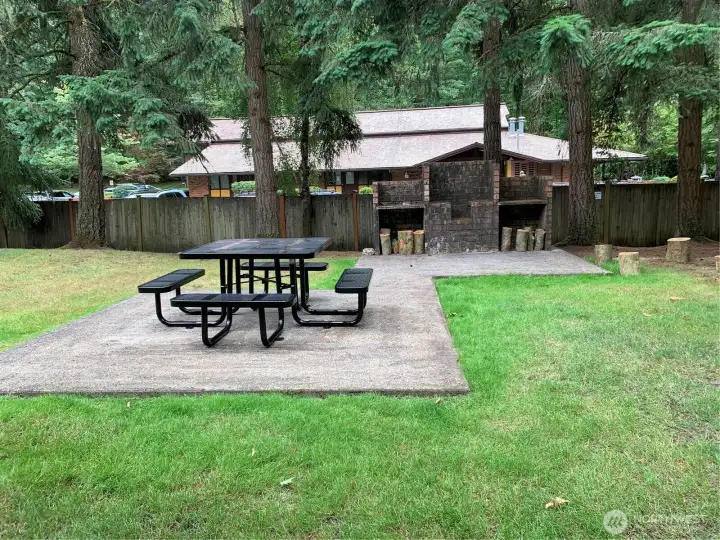 Community park has picnic area. Library is on other side of fence. Community park has picnic area. Library is on other side of fence.