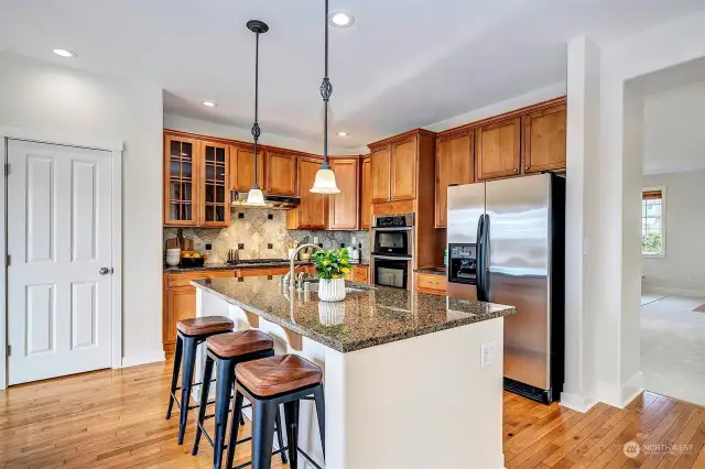 Kitchen with pantry, SS appliances, & gas cooktop