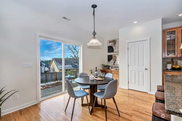 Eating area off kitchen, built-in desk area, & pantry