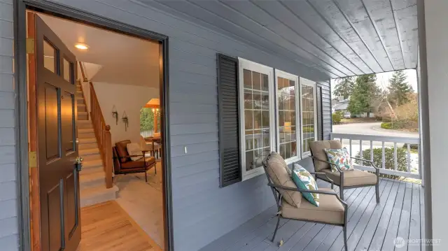 Charming front porch welcomes you home with inviting curb appeal.