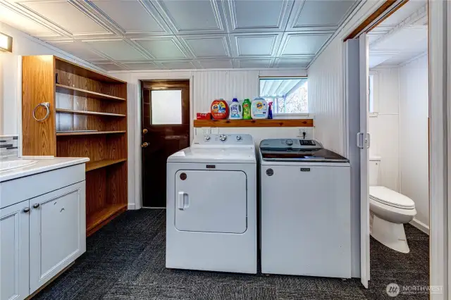 Laundry room and the 3/4 bath.