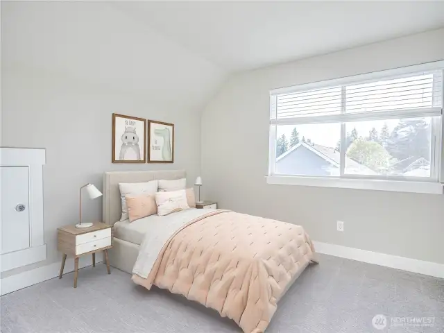 Number one of the two upstairs bedrooms