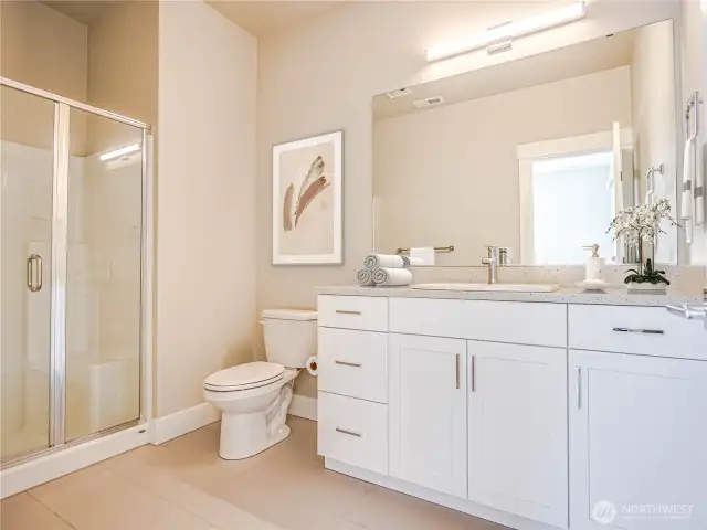On the entry level as part of the suite of rooms is a 3/4 bath