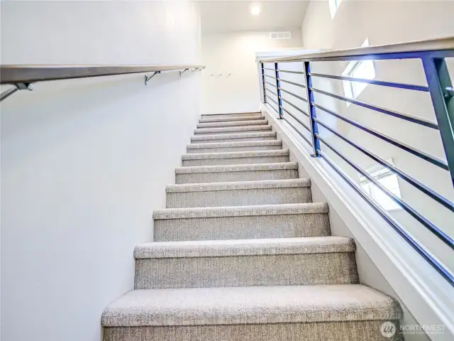 Staircase going up from entry level of home