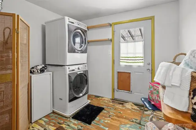 Laundry room w/ stacked Washer & Dryer