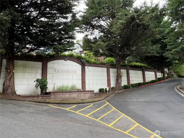 Entrance to Regentwood condo association. The complex is on the hillside with a private greenbelt, and trails. Centrally located near #522, I-5, #405, and downtown Bothell, trails, and parks, shopping, and restaurants. Juanita Beach, and Woodinville are nearby.