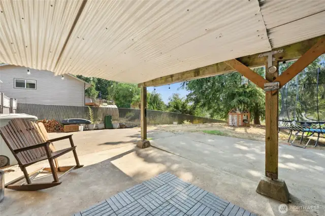 A covered patio for enjoying the outdoors year round.