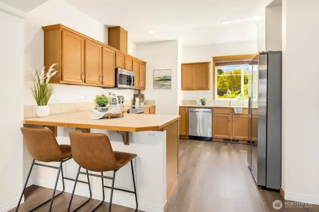 Large kitchen with new appliances, sink and faucet!