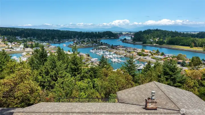 Stunning views of Shelter Bay marina, Swinomish Channel and the Rainbow Bridge. Mount Baker is spectacular on a clear day!