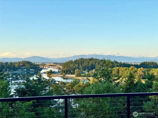 Stunning VIEWS of Rainbow Bridge and Mount Baker from Primary Bedroom and Great Room. An amazing backdrop for dinner on the gorgeous deck.