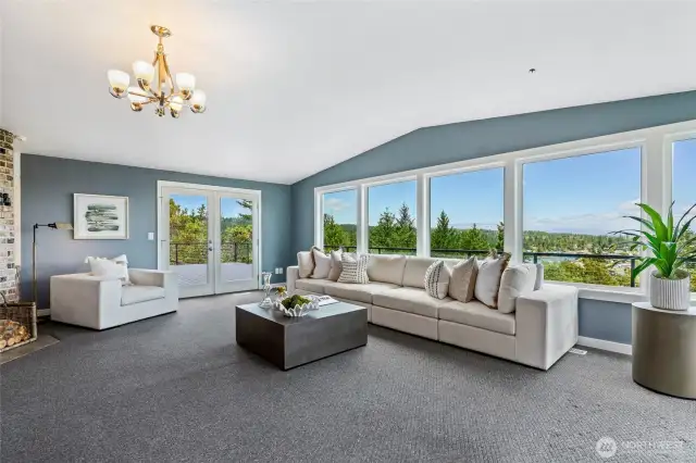 The expansive windows bring the outside in.