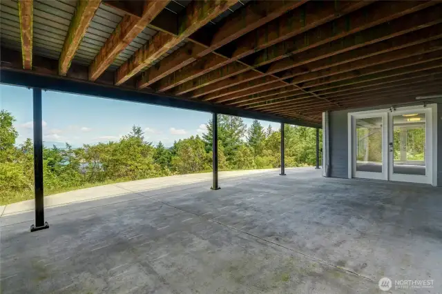 Under deck parking with easy access to lower level Family Room and Garage.