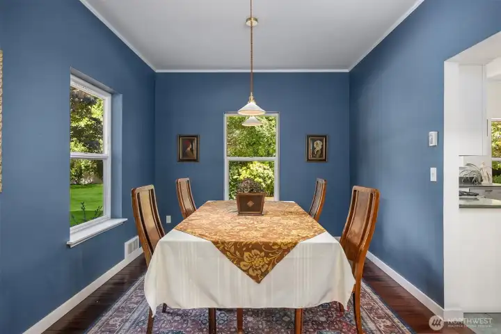 Windows look out onto the backyard garden and let in plenty of sunshine!