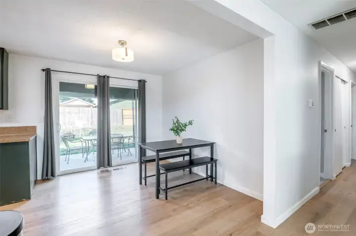 Eating area off of kitchen. Slider leads to backyard.
