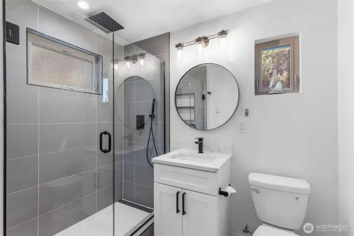 Modern fixtures and timeless tilework—spa-like luxury at home.