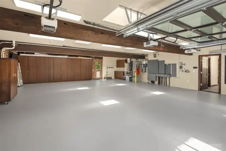 Garage has built in storage, pent wash station, and new epoxy floor