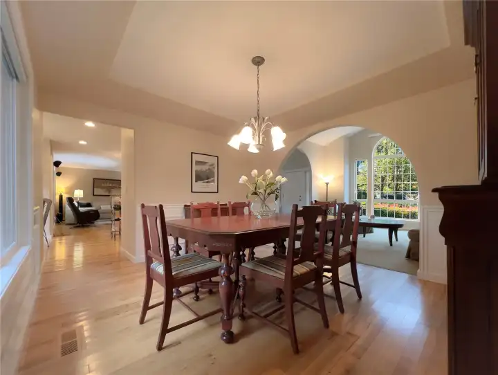 Formal Dining looking towards Living Room to right and Kitchen to left.